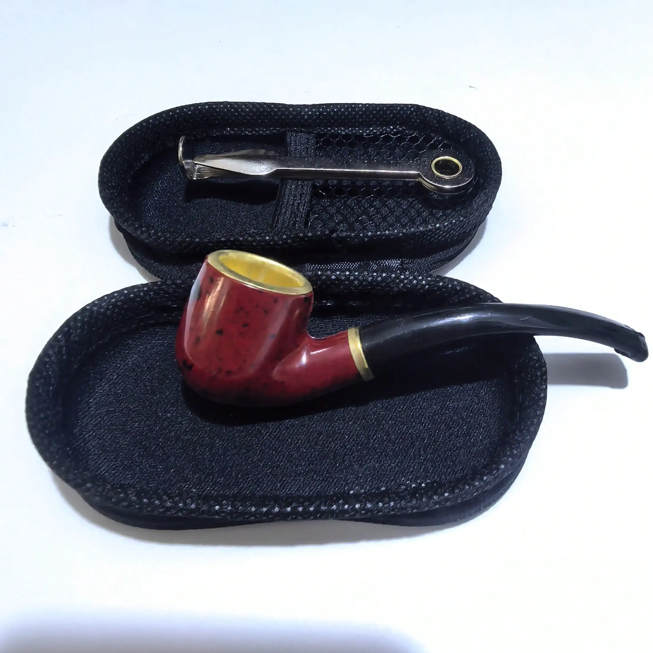 3-in-1 Smoking Kit Includes pipe, cleaning tools, and travel bag. A complete accessory set for pipe smokers.