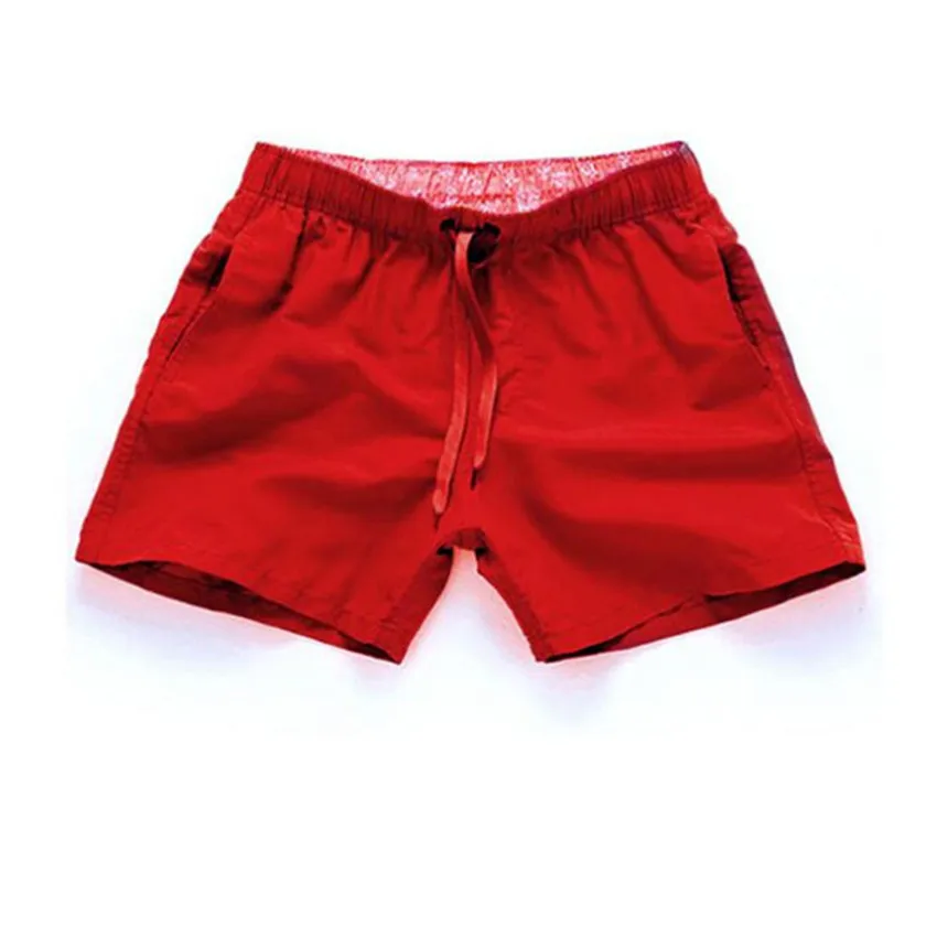 Solid color sports shorts for men\'s summer 2024 hot selling beach pants for loose and casual sports