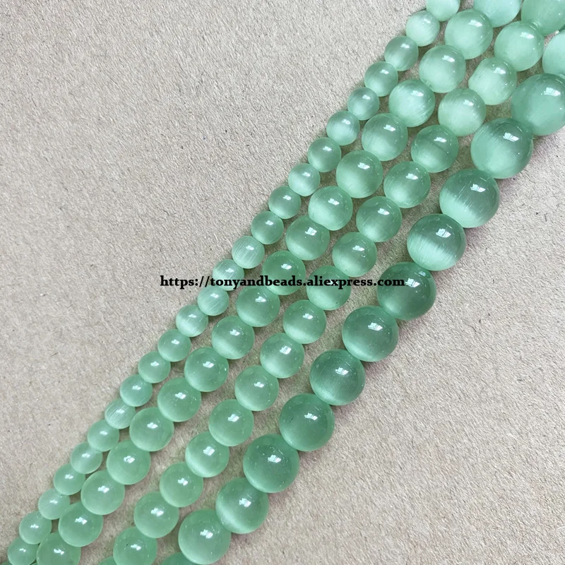 Natural Moon Stone Lt Green Cat Eye 15\