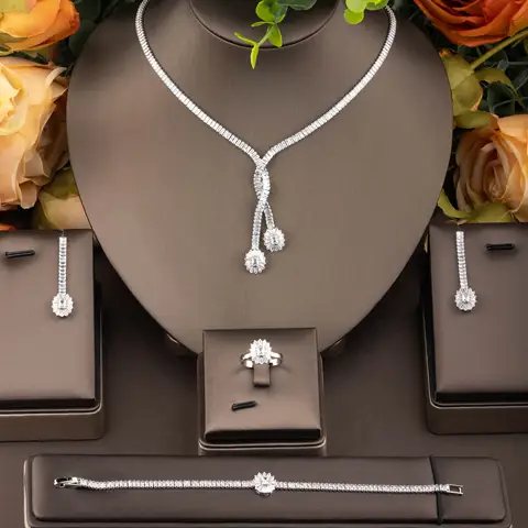 1 set of minimalist style jewelry set with sparkling cubic zirconia encircling a floral cluster design, suitable for women to wear at weddings and banquets. Gift box not included