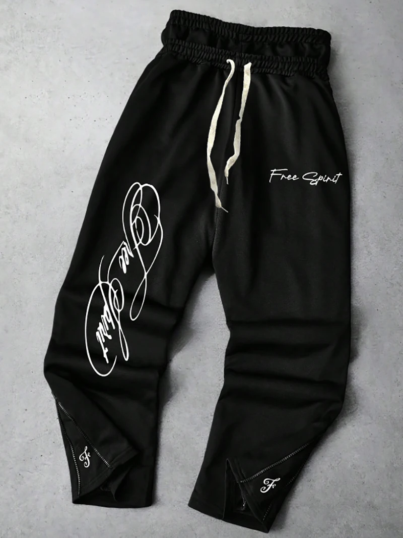 Pantalones deportivos de dos piezas de imitación negros de estilo callejero Ins High Street para hombre con detalles únicos de cintura y cremallera en el tobillo. Es perfecto para trajes de festivales de música o uso diario, hace un gran regalo para su novio o marido. Es la mejor elección para pantalones casuales hasta el tobillo con cremallera de dos piezas de imitación para hombres, pantalones de chándal negros para hombres y pantalones estilo callejero para hombres