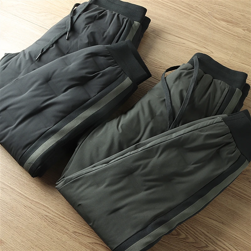 

Мужские повседневные теплые ветрозащитные пуховые брюки: модные городские стильные длинные штаны с функцией сохранения тепла, не объемные, с разделительными вставками