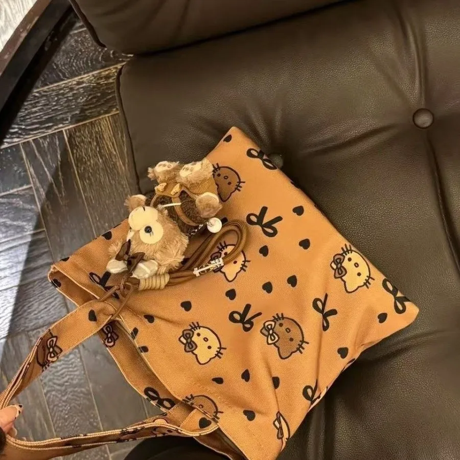 Novo dos desenhos animados sanrio olá kitty bolsa menina lona sacola kitty bonito grande capacidade saco de almoço versátil saco de armazenamento estudante