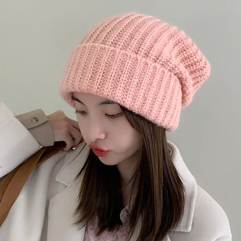 Czapka zimowa dla kobiet Solid Color Stripe Knit Beanies Loose Elastic Heap Heap Cap Warm Thicken Bonnet Fashion Woolen Pullover Cap