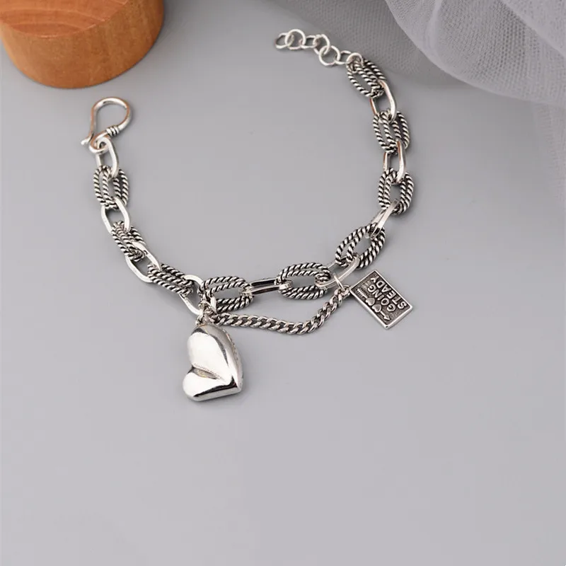 QMCOCO Silver Color Design Asymmetric Heart-Shape Pendant Square Letter Bracelet Woman Fashion Personality Jewelry Accessories