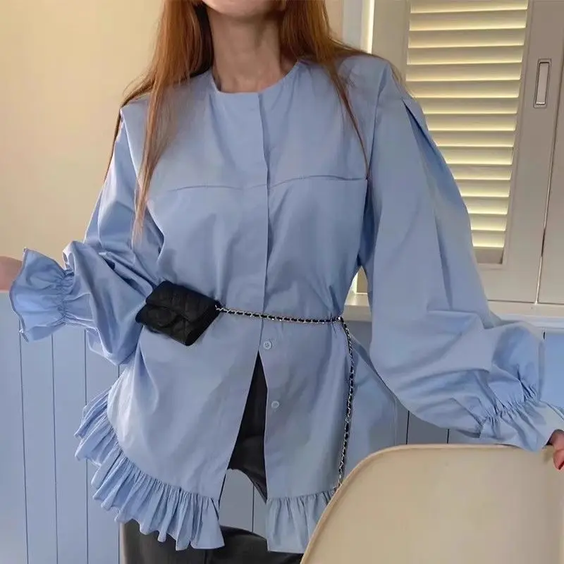 

Spring niche design round neck splicing ruffle edge loose versatile medium and long horn sleeve shirt