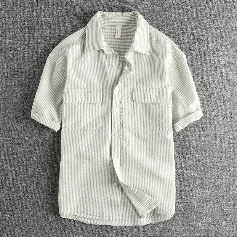 Custom woven seersucker breathable fabric vintage tooling short-sleeved shirt for men summer all fashion youth lapel T-shirt