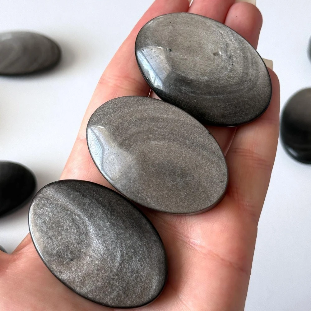 

Natural Crystal Silvery Obsidian Palm Stone Fashionable Meditation Handheld Stone Perfect Gift for Home Decor and Office Display