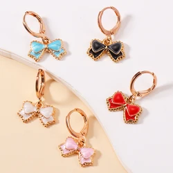 Vendita calda lega smalto Color caramella orecchini pendenti Bowknot per le donne ragazze bambini simpatici orecchini pendenti regali di gioielli per feste di compleanno