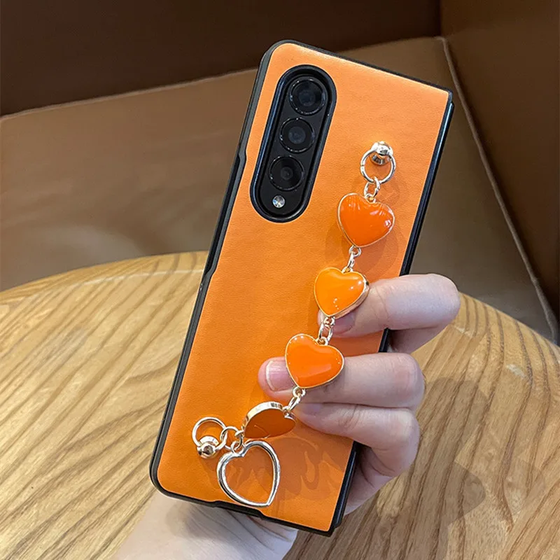 Luxe Oranje Liefde Armband Lederen Telefoonhoes Voor Samsung Galaxy Z Fold 6 Zfold 5 Zfold4 Zfold 3 2 Draagbare Lanyard Cover Etui