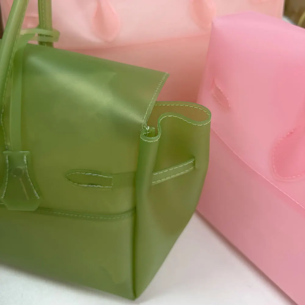 Alt: "Women's Transparent TPU Jelly Tote Bag from Acuvick"