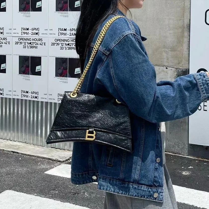 

2026 New First-layer Cowhide Hourglass Bag Women's Pleated Chain Casual Personality Design High-end Shoulder Messenger Bag