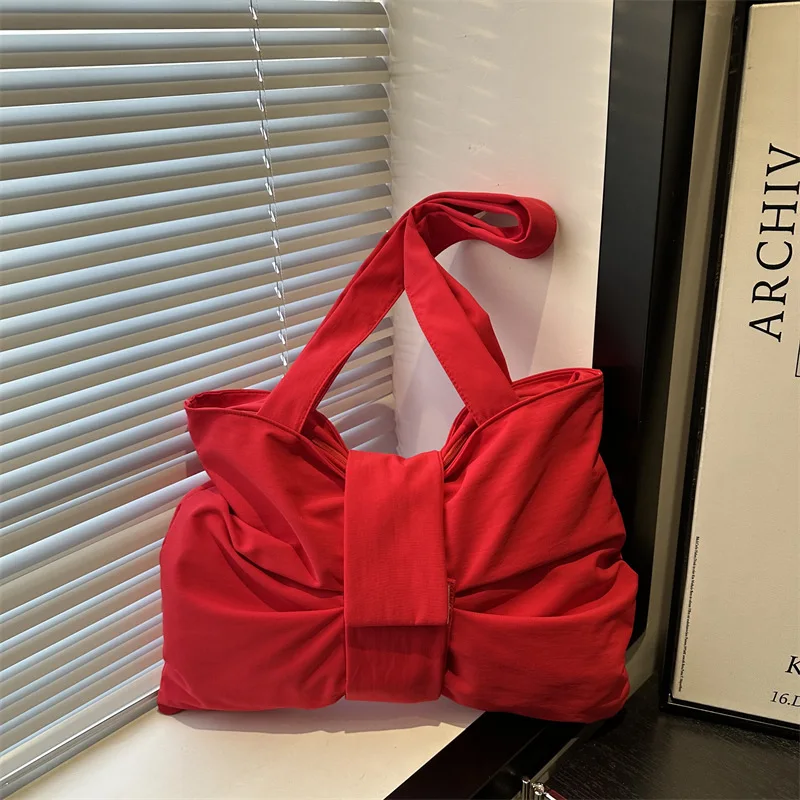 

2025 New Simple Canvas Bag Shoulder Handbag Cute Exquisite Bow Niche Messenger Commuter Tote Bag