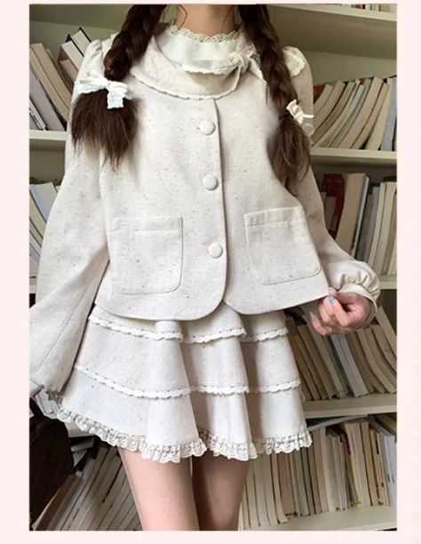 Otoño Invierno nuevas mujeres agradable arco blanco roto lindo cuello Peter Pan Chaqueta corta moda reductor de edad versátil Top de manga larga