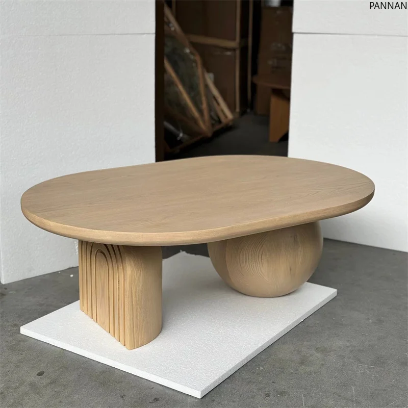 Medieval wabi sandy wind designer oval coffee table simple creative living room solid wood coffee table