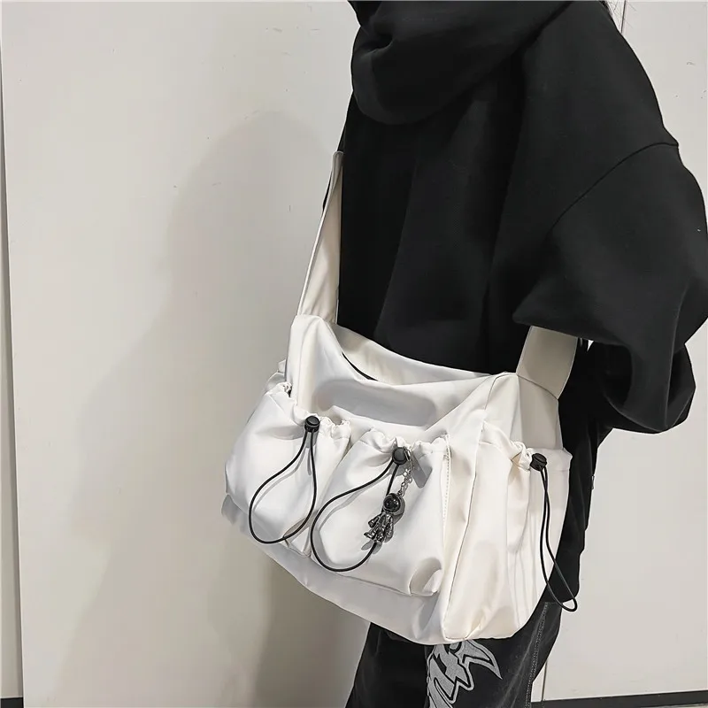 Fashion brand literary youth shoulder bag (female ins style) solid color lovers versatile work clothes bag (male canvas bag)