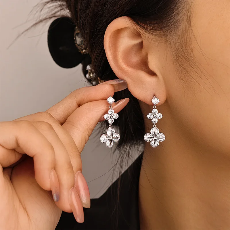 Shiny zircon pure copper four-pointed star fringed stud earrings earrings women's light luxury high-end earrings Christmas gifts