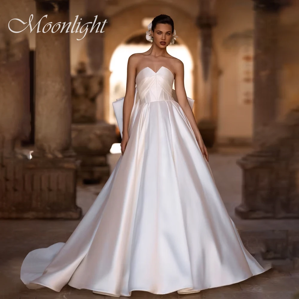 

Современное плиссированное свадебное платье трапециевидной формы без бретелек с бантом 2026 свадебное платье без рукавов с открытой спиной и скользящим шлейфом Vestidos De Novia по индивидуальному заказу