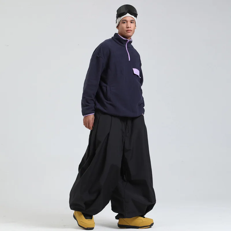 Gsou Snow nuevos pantalones de esquí sueltos de gran tamaño para hombres y mujeres pantalones de nieve de moda al aire libre impermeables profesionales térmicos de invierno
