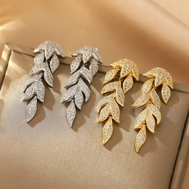 

Silver needle zirconium leaf tassel personalized earrings, fashionable and high-end ear studs, elegant ear ornaments for women