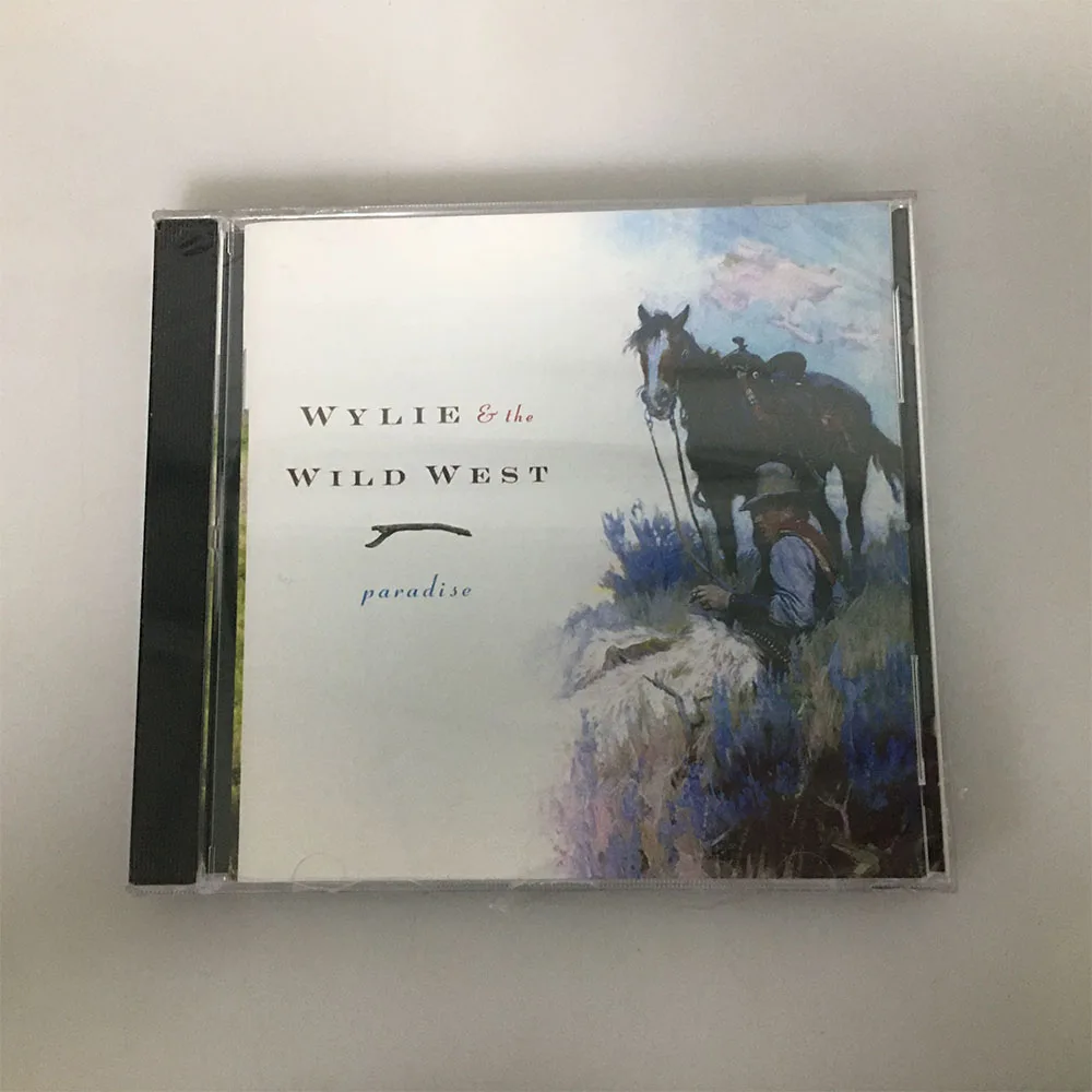 

CD This Is The Classic Album 'Paradise' By Wylie & The Wild West, A Representative Country Music Band From The American West.