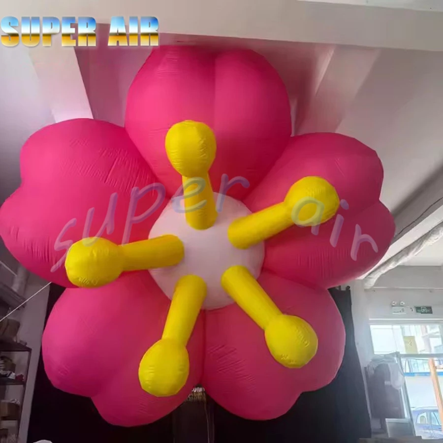 Modelo de planta enorme súper aire utilizado para publicitar una flor rosa inflable huanging