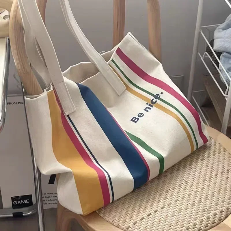 

new 2025 Simple Line One Shoulder Canvas Bag Korean Edition Leisure Art Student Shopping Bag Commuter Computer Handbag