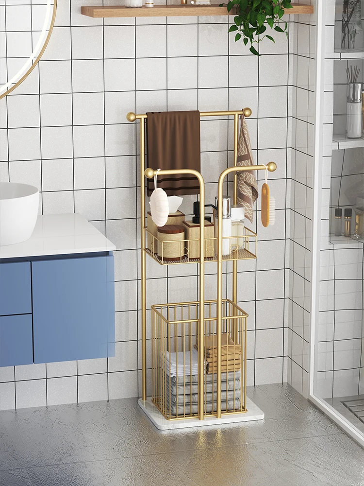 bathroom, bathtub side rack, floor-to-ceiling light luxury rock slab, bath towel, towel storage rack, dirty clothes basket.