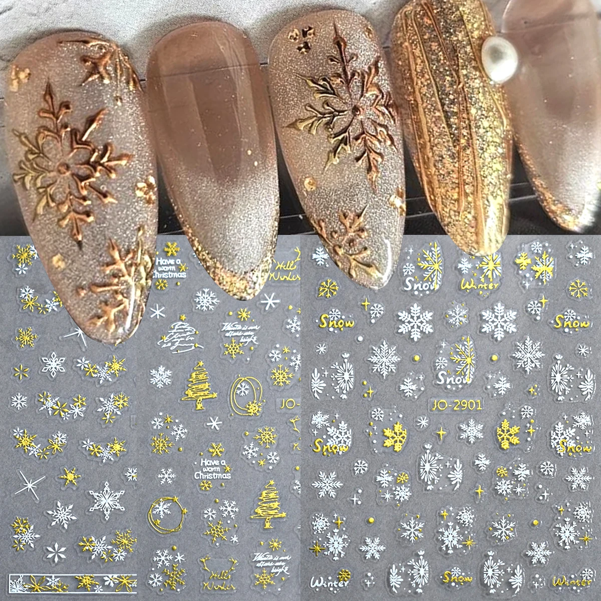 Gold and silver snowflake nail stickers; holographic nail decorations featuring snow globes, bells, and stars; Christmas nail ar