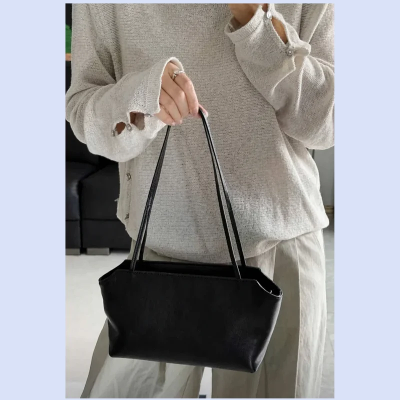 Women's small lambskin shoulder bag with simple design for commuting and niche use, suitable for carrying under the arm