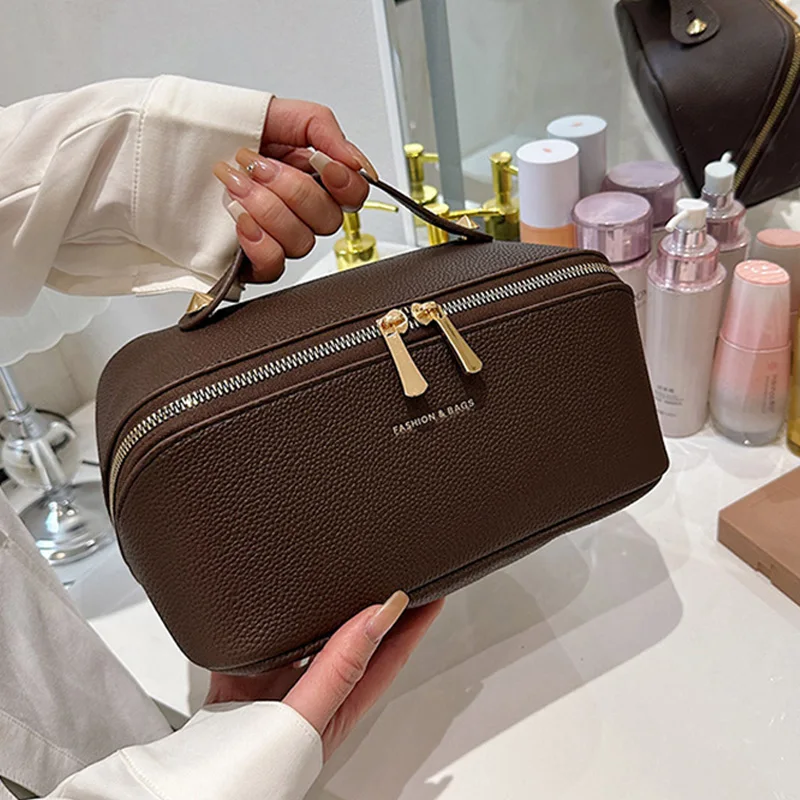 

Новая портативная косметичка большой вместимости для женщин, сумка для хранения косметики, дорожная сумка из искусственной кожи для путешествий, 2026 год