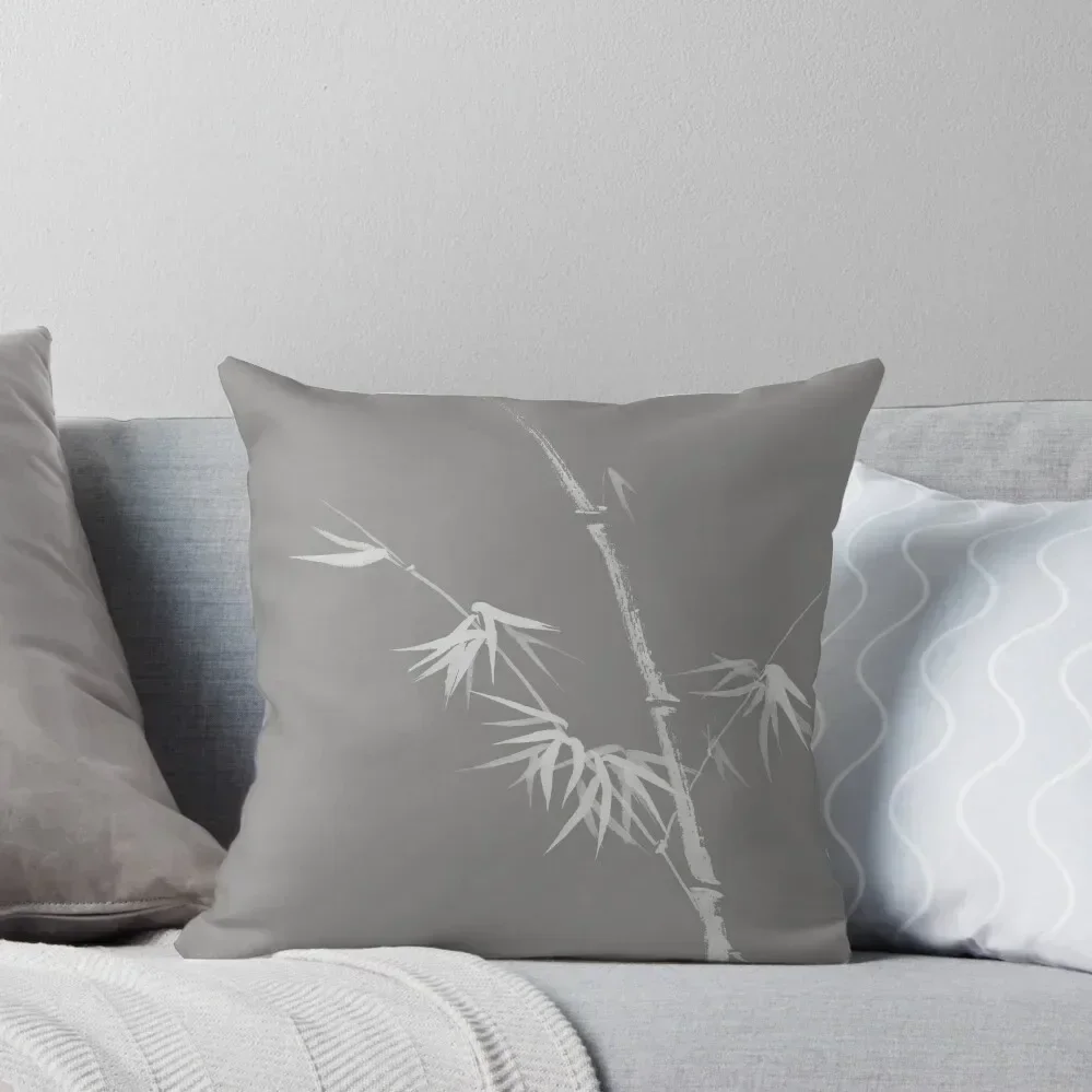 Hermoso y sencillo diseño de ilustraciones Zen japonesas de bambú con hojas jóvenes sobre fondo gris claro, almohada con estampado artístico