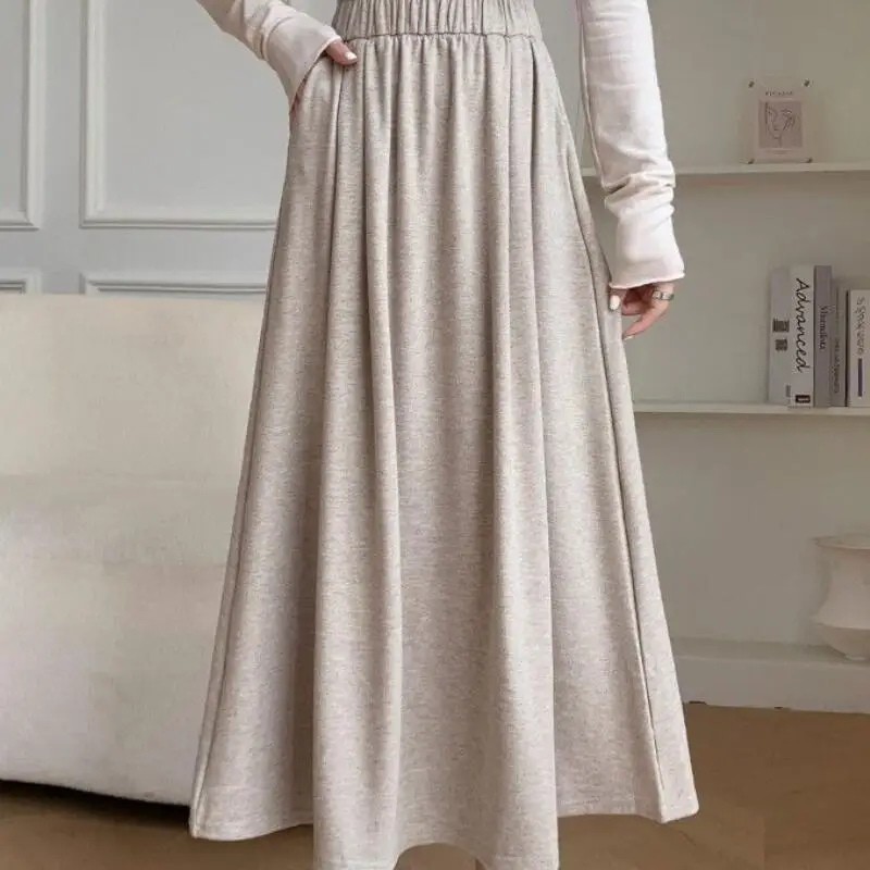 Gonna da ragazza Anni primaverili e autunnali Nuovo modello Gonna a ombrello di media lunghezza a vita alta Shorty Gonna lunga drappeggiata pigra Dopamina Hot