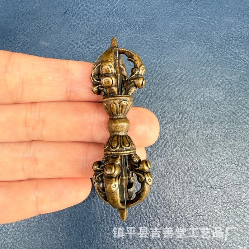 - brass five-pronged , puja , Tibetan-style vajra scepter pendant