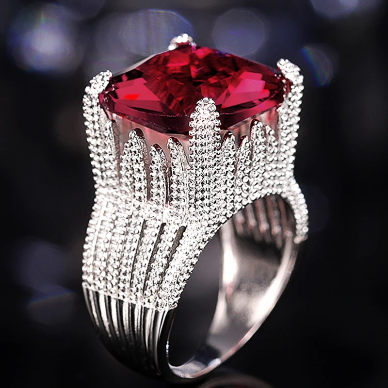 Huitan geometrische rote kubische Zirkon Luxus ringe für Frauen Hochzeits feier edle weibliche Accessoires Phantasie Geschenk modernen trend igen Schmuck