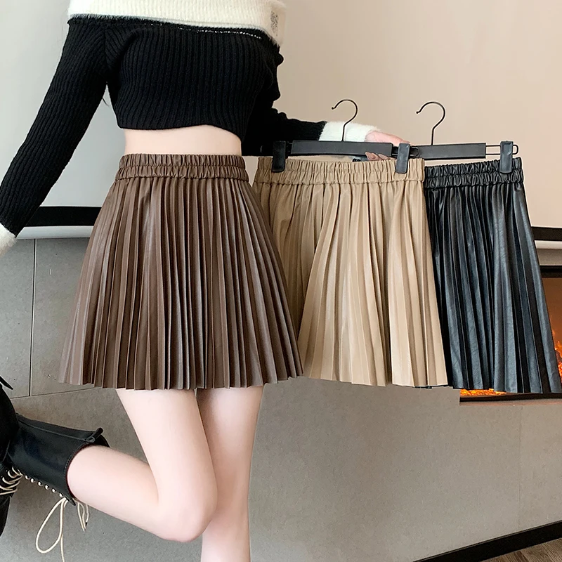 

Винтажные черные женские плиссированные сексуальные мини-юбки из искусственной кожи с высокой талией, новинка 2025, свободные короткие юбки для фигуристов, женские осенне-зимние