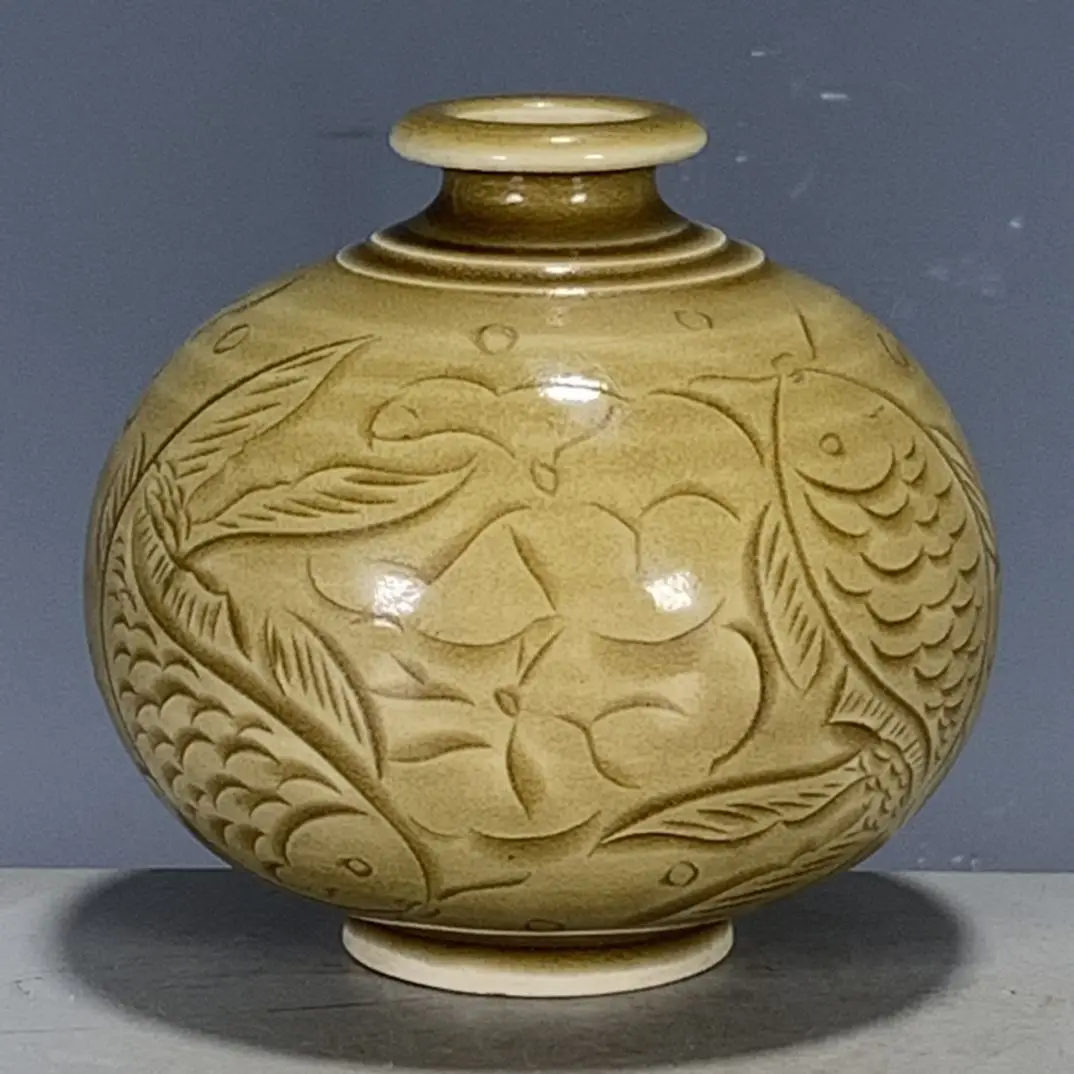Collectible Song Dynasty Yue Ware Celadon Vase with Large Bulbous Belly, Decorated with Interlocking Floral Scroll Motifs