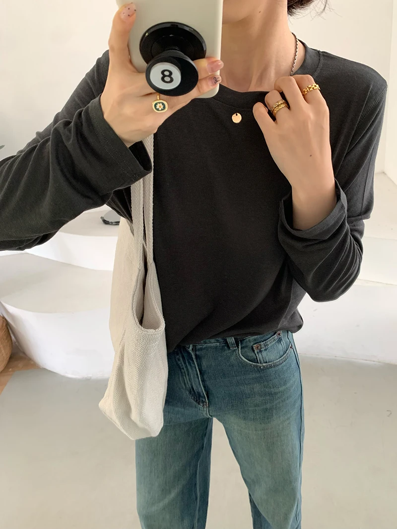 T-shirt ampia a maniche lunghe girocollo tinta unita casual da donna autunno e inverno