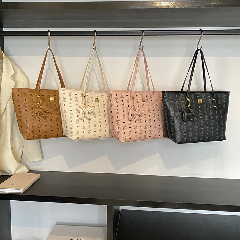 

Simple Solid Color Mini Tote Bag For Casual Women With Crossbody Option And Fashionable Minimalist Vibe