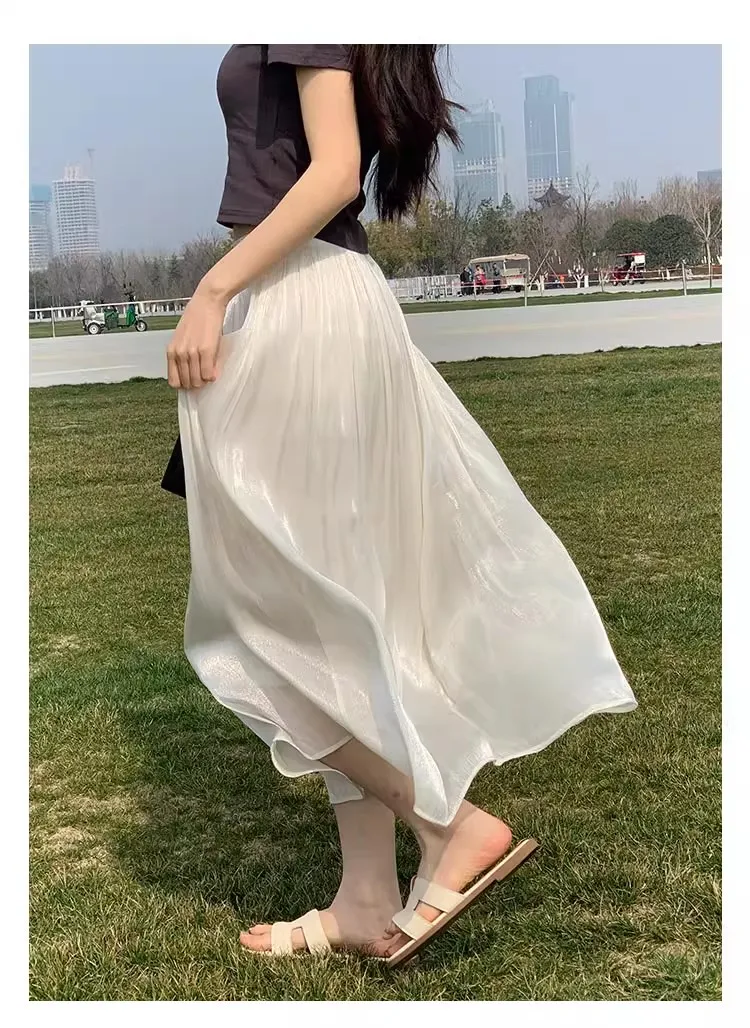 2026 Frühjahr/Sommer Neuer Glänzender A-Linien-Rock für Damen, Einfarbig, Hohe Taille, Französischer Pariser Stil, Eleganter Asymmetrischer Rock – Detail 24