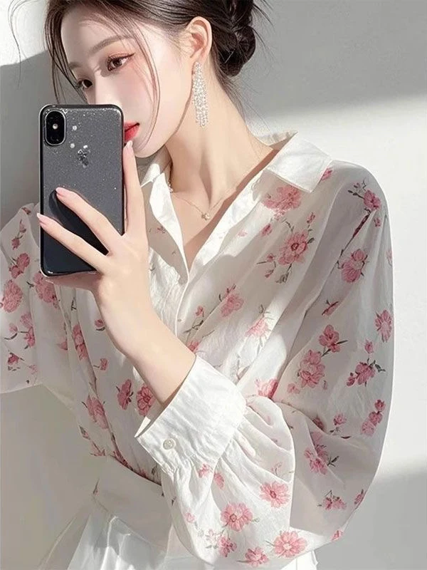 เดรสยาวพิมพ์ลายดอกไม้สีขาวสำหรับผู้หญิง แฟชั่นฤดูใบไม้ผลิใหม่ สไตล์หรูหรา ให้ความรู้สึกดี เหมาะสำหรับใส่ไปทำงาน ทรงหลวม