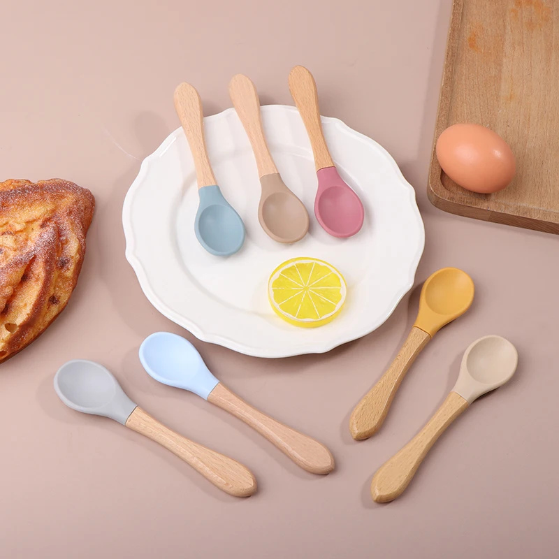Cucchiaio di legno per bambini cucchiaio per l'alimentazione del bambino in legno di Silicone cucchiaio con punta morbida manico in materiale alimentare senza BPA per regali per bambini piccoli