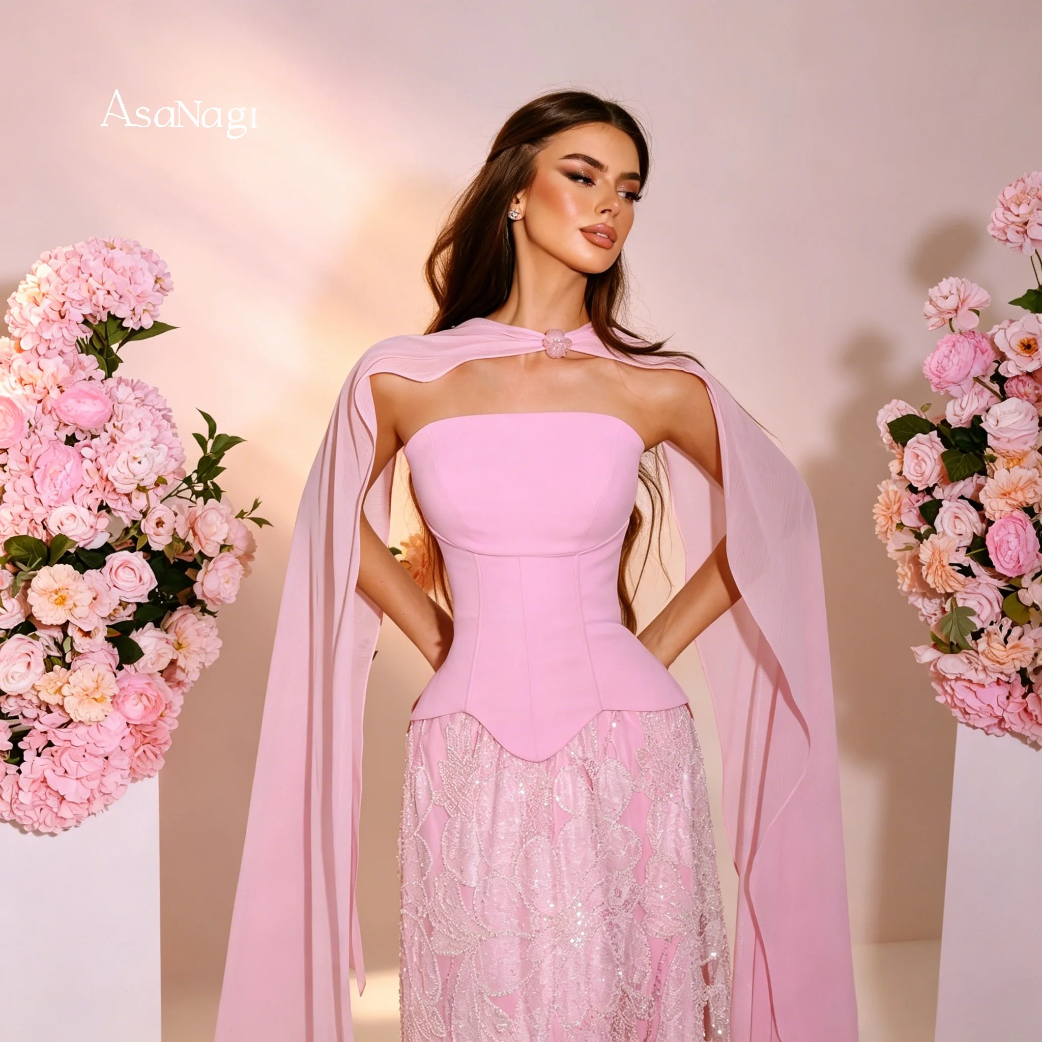 

The AsaNagi Premium Pink Strapless A Line Lace Floor Length Gown accompanied by a matching pink shawl is a stylish and elegant