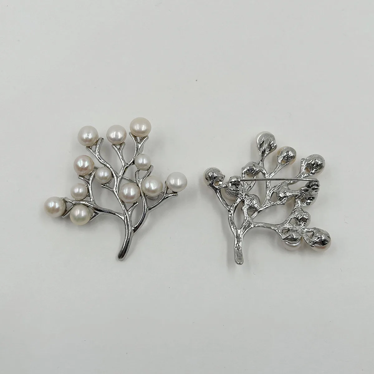 

100% nature freshwater pearl brooch -very fashion high quality AA pearl, silver flower shape ,many pearls