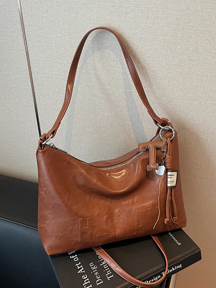 

Винтажная большая вместительная сумка подмышки для женщин, текстурированная искусственная кожа, дорожные сумки на плечо, женская повседневная сумка через плечо с пряжкой