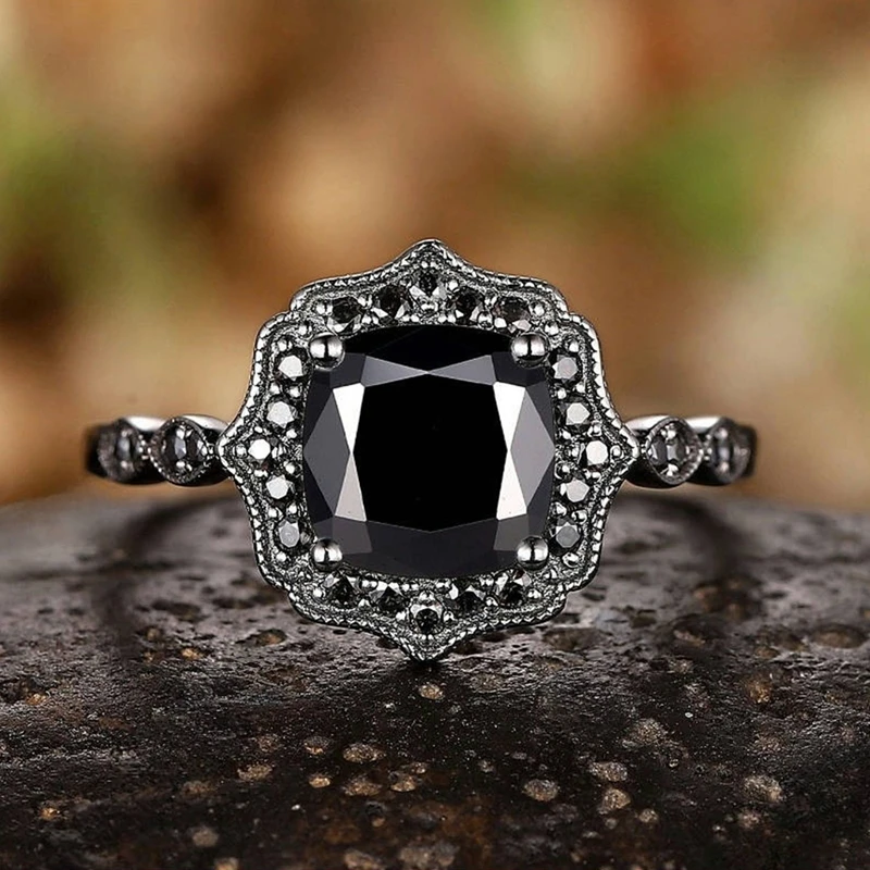 Nuevo anillo de mujer versátil personalizado con incrustaciones de circonita negra de moda europea y americana