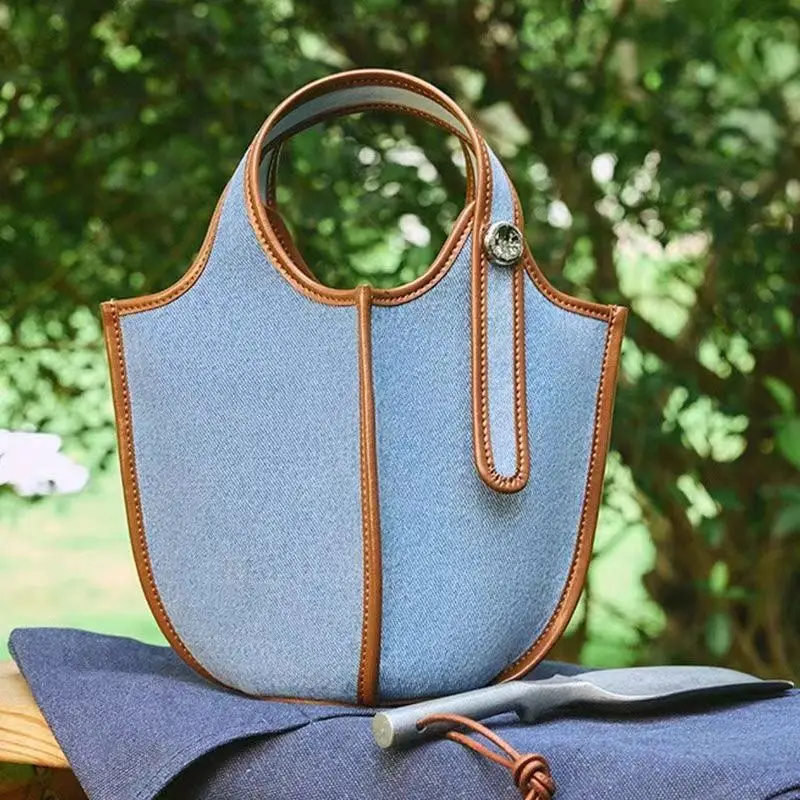 

Fashion luxury soft handle denim women's bag designer lightweight French casual hanging basket horizo​​ntal large capacity han