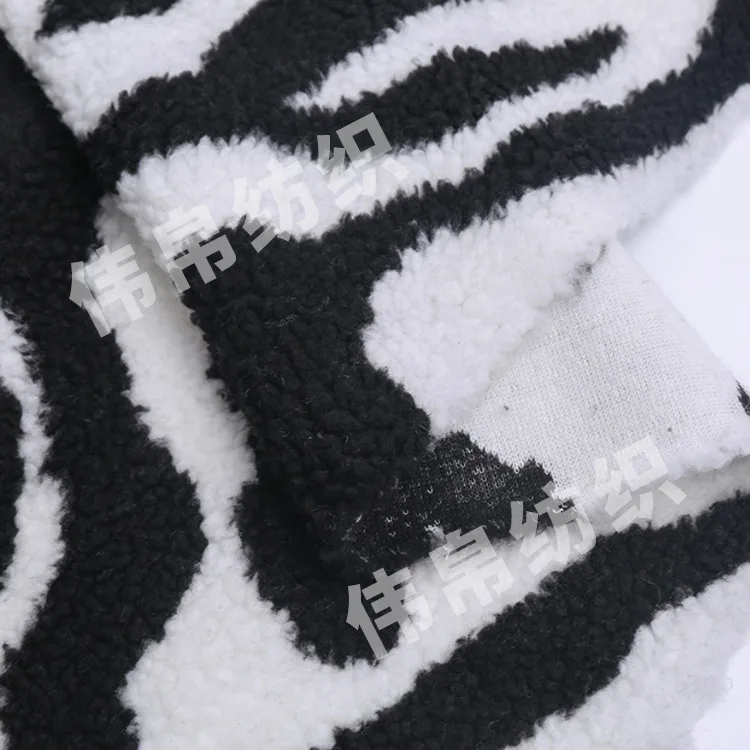 

Winter Warm Berber Fleece Coat Knitted Fabric Zebra Jacquard Polar Fleece Fabric