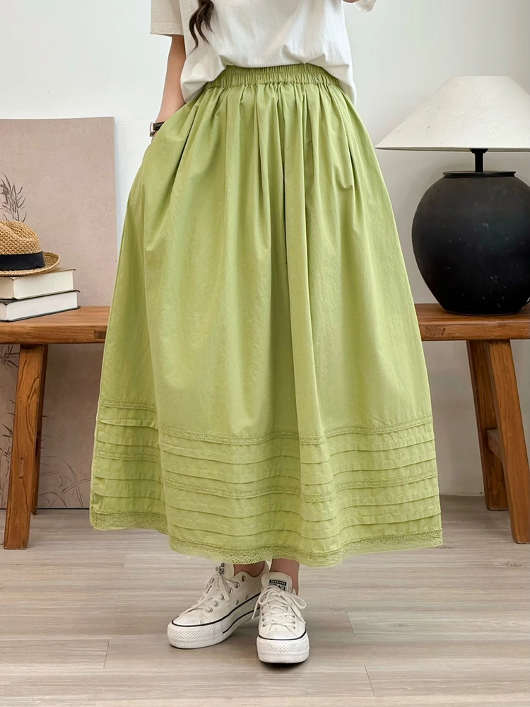 レトロな芸術的な純綿レーストリムスプライシングミディスカート女性の夏の新しいSle Ele中空花柄fボディスカート