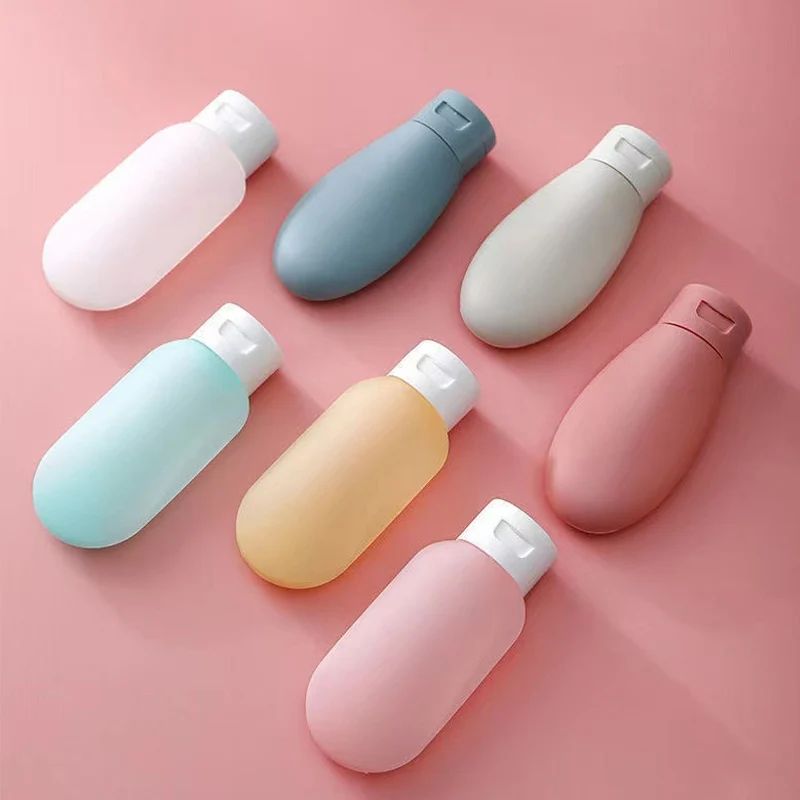 4 Pcs/set Refillable Bottle Set 60ml Silicone Liquid Lotion Container Squeeze Tube Empty Bottle Portable Travel Shampoo Bottle